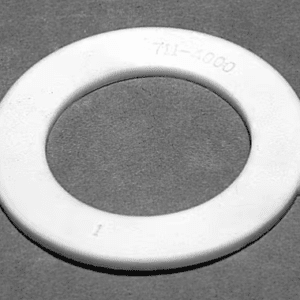 White circular plastic ring with Waterway 711-4000 1.5 Inch Union Heater Gasket embossed on top, resting on a gray background.